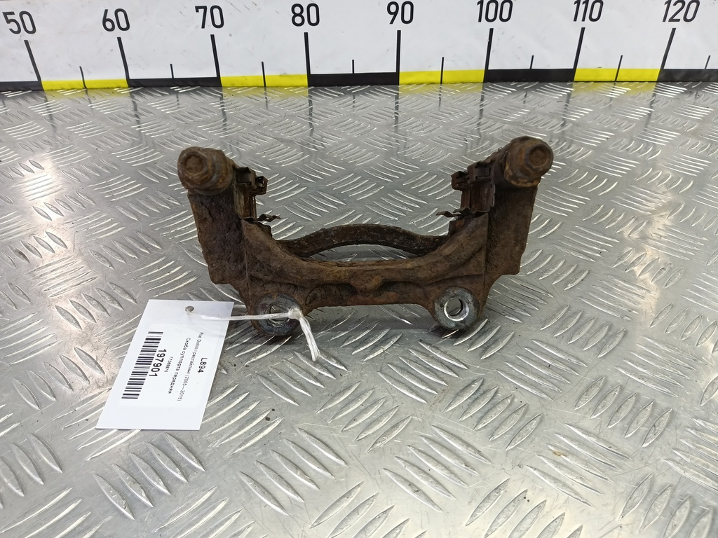 скоба суппорта Fiat Doblo 1.4 MT (78 л.с.)Doblo  I рестайлинг (2005—2015) Фургон 77365975, 1550 рублей, Москва