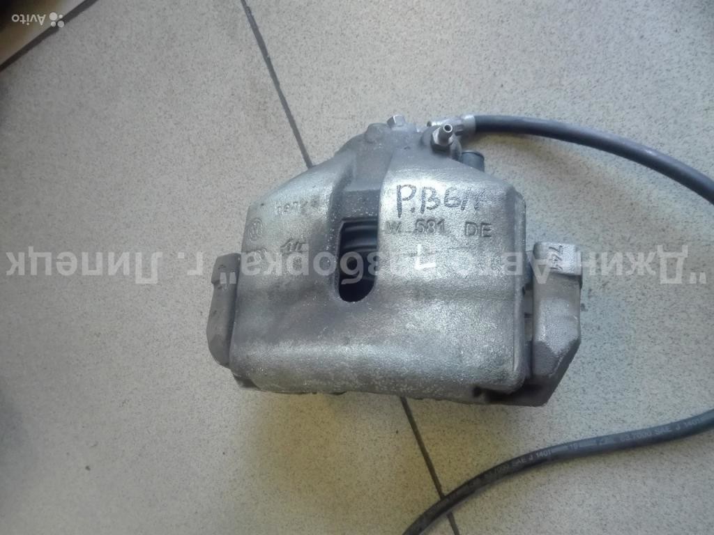  Суппорт передний левый