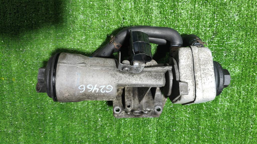 045115389g Корпус масляного фильтра Volkswagen Passat (B6) 2005-2010