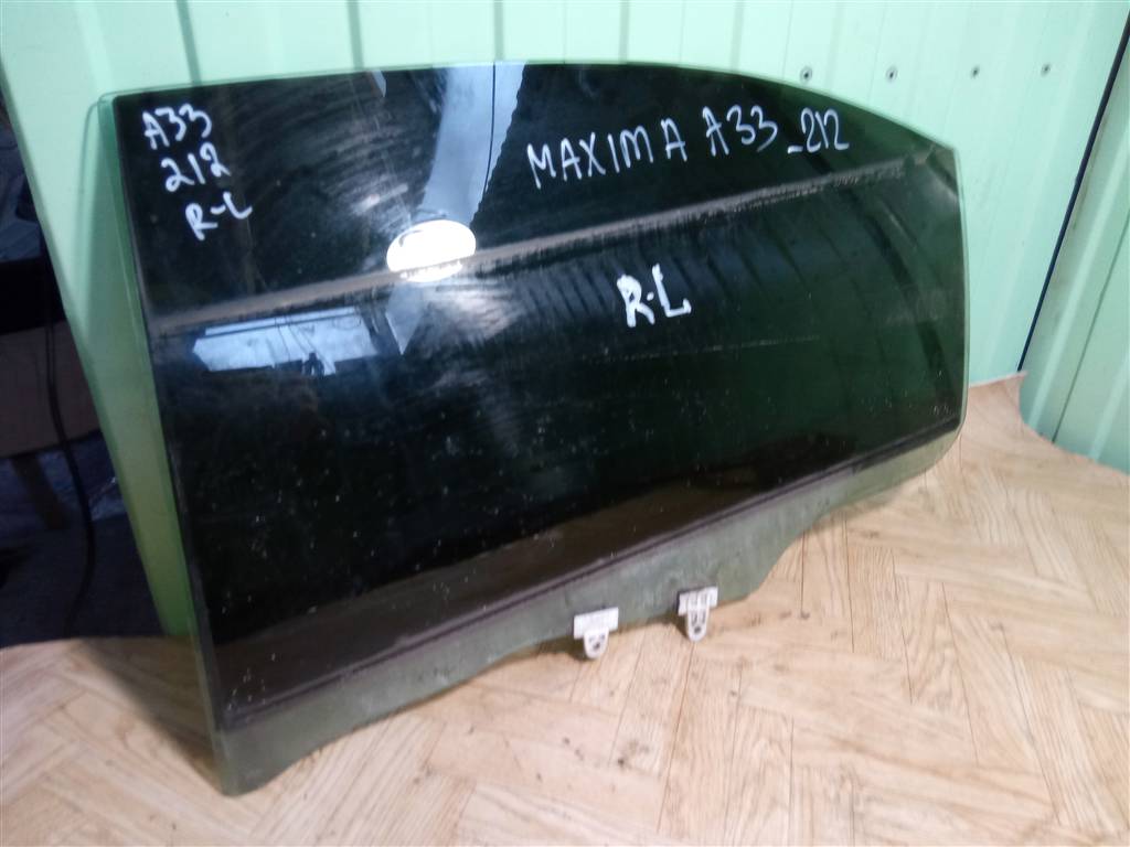 Стекло заднее левое