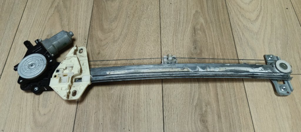 Стеклоподъемник электр. передний левый